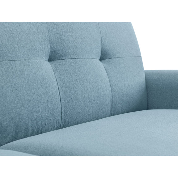 Close-up of a light blue sofa with tufted backrest on a white background