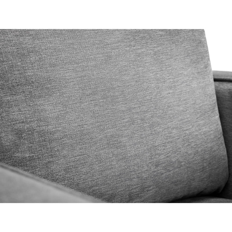 Gray fabric surface of a sofa with a white background