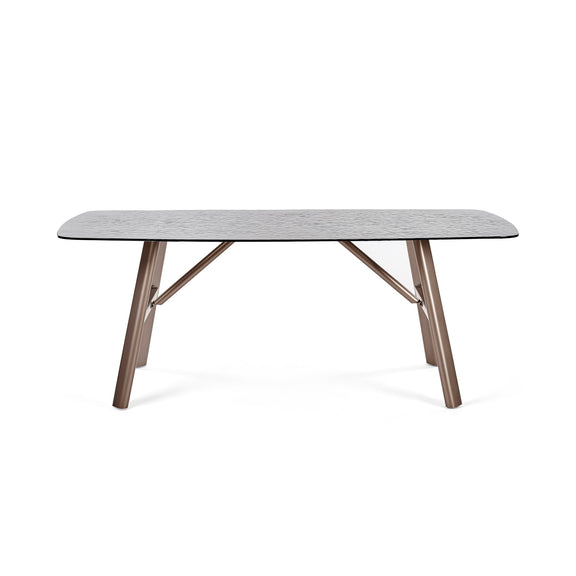 Rectangular dining table with a gray top and wooden legs on a white background