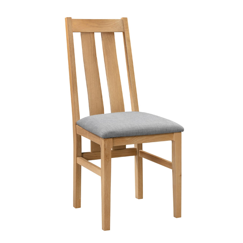 Wooden chair with a gray cushion on a white background
