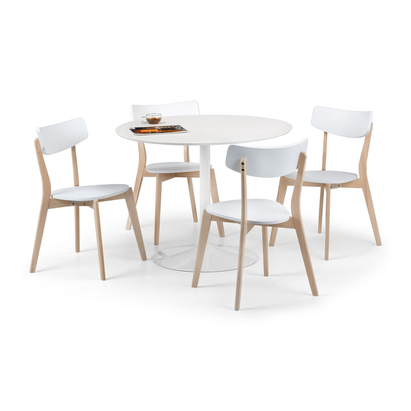 Round white table with four matching chairs on a white background