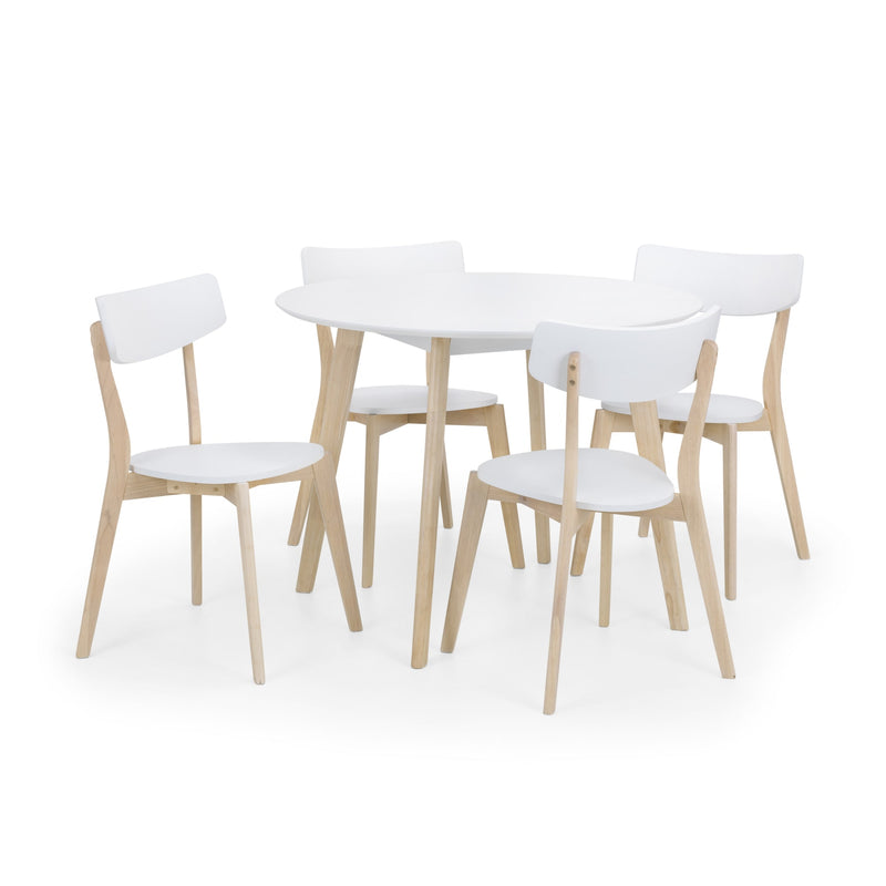 Dining table set with four chairs on a white background