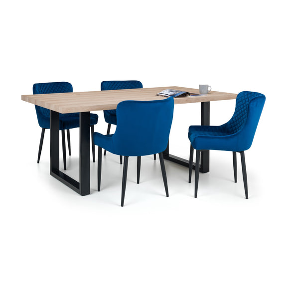 Dining table with four blue chairs on a white background