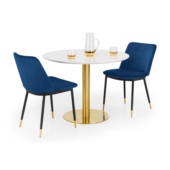 Round white table with gold base and two blue chairs on a white background