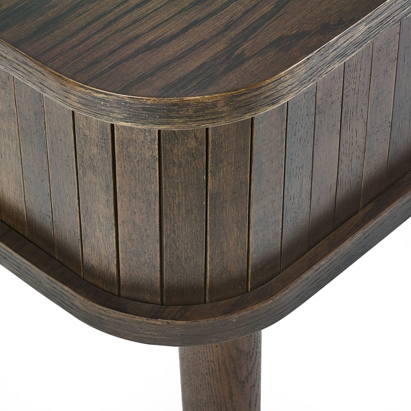 Close-up of a wooden table with a slatted design on a white background