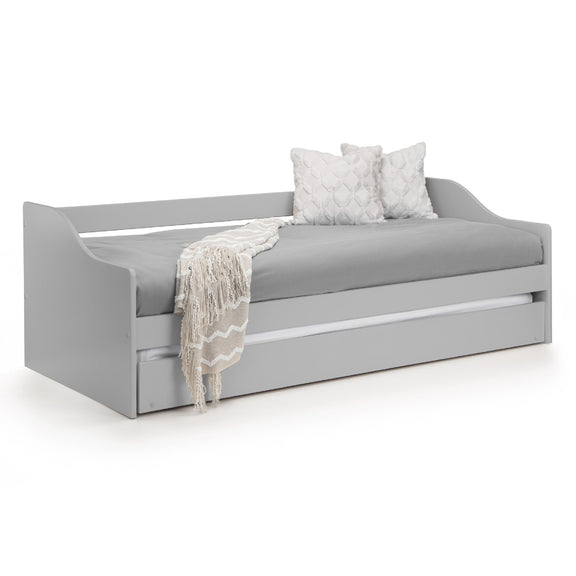 Gray daybed with white pillows and a blanket on a white background