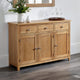 Wooden sideboard with decorative items in a room setting