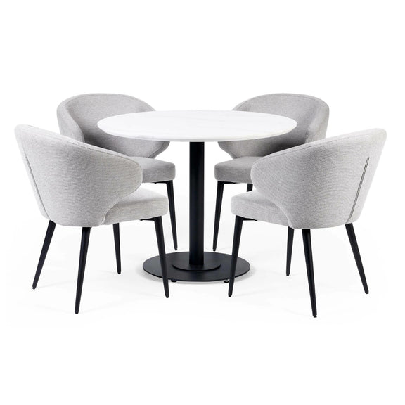 Round white table with four gray chairs on a white background