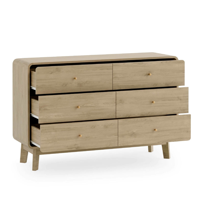 Wooden dresser with multiple drawers on a white background