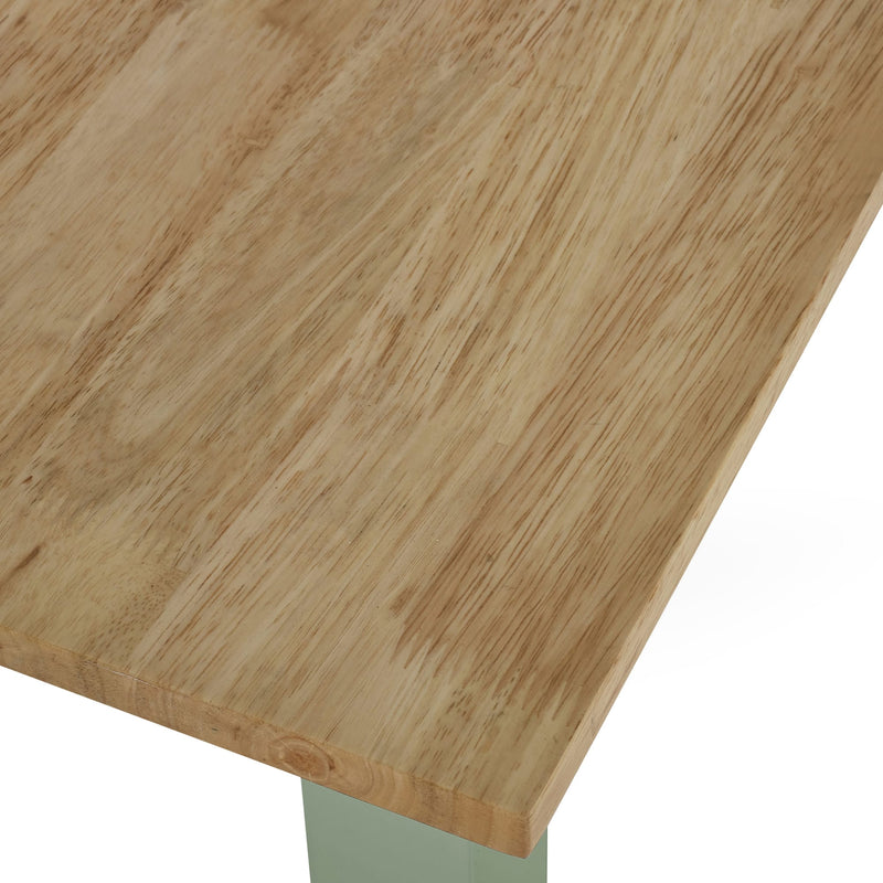 Close-up of a wooden table surface with a white background