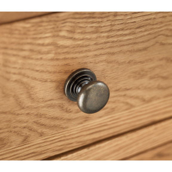 Wooden surface with a metal knob