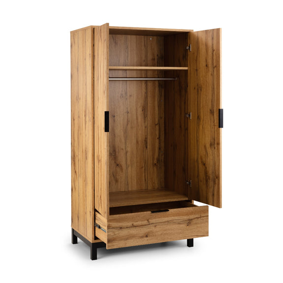 Wooden wardrobe with open doors on a white background